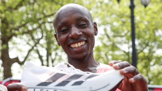 Sabastian Sawe celebrates with his adidas supershoe