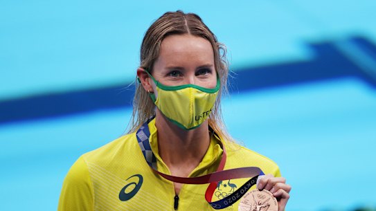 Emma McKeon celebrates her bronze medal.