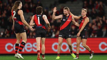MELBOURNE, AUSTRALIA - JULY 17: Jake Stringer of the Bombers celebrates kicking a goal during the round 18 AFL match between the Essendon Bombers and the Gold Coast Suns at Marvel Stadium on July 17, 2022 in Melbourne, Australia. (Photo by Graham Denholm/AFL Photos via Getty Images)