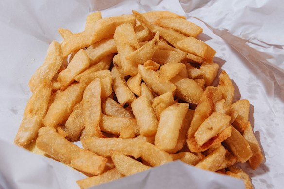 The beef dripping chips in paper at Rosie's.