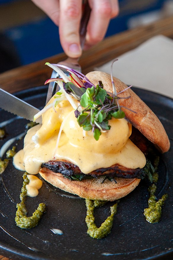 Eggs benedict with apple wood smoked thick cut maple bacon and lemon myrtle hollandaise.