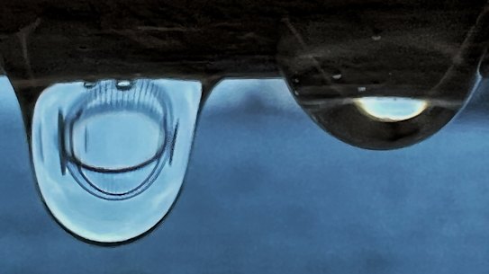 Global warming causes higher water temperatures which cause water evaporation which leads to moister air, especially in Sydney.