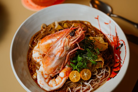 Sarawak laksa at Past/Port is darker than curry laksa and uses thinner vermicelli noodles.