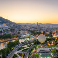 Evening view of Tbilisi and its Peace Bridge.