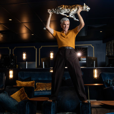 Baz Luhrmann in his Gold Coast-based theatrette modelled on Elvis’ suite in the Las Vegas Hilton in the 1970s. The director is known for persuading Hollywood studios to give him huge budgets for his films.