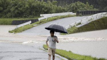 A flooded road is seen during heavy rain in Soo City, Kagoshima Prefecture, southwest Japan. 