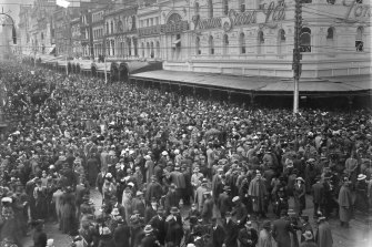 Images such as this one, of a Bourke Street crowd in the early 20th century, had a special poignancy  for Berger in the depths of Melbourne’s long COVID lockdowns.