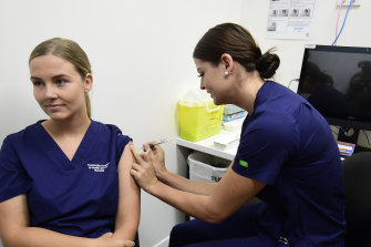 Registered nurse Rebecca DeJong received a COVID-19 vaccination at Townsville University Hospital last month.