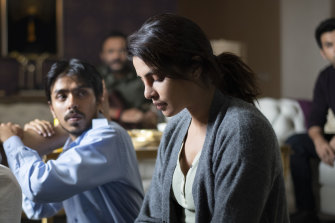 Adarsh Gourav, ​Priyanka Chopra Jonas and Rajkummar Rao in The White Tiger.