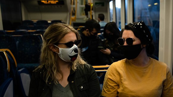 The NSW government is under increasing pressure to make masks mandatory on public transport.