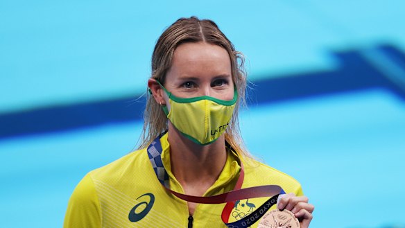 Emma McKeon celebrates her bronze medal.