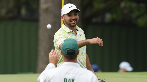 Jason Day celebrates a birdie on the third hole in his second round.