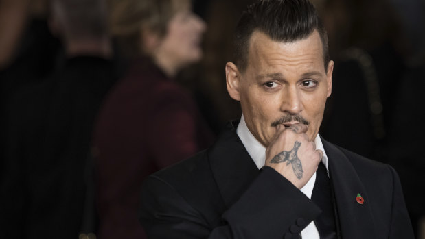Johnny Depp has been hit with an assault suit.