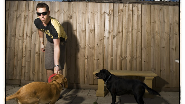 Nick Maxwell with his dogs Ralph and Macie in 2008