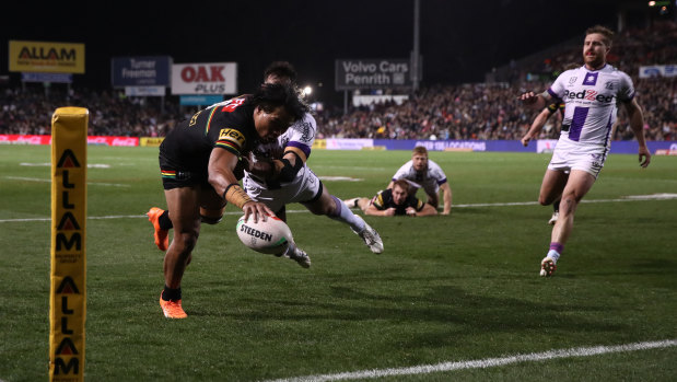 Winger Brian To’o crosses for the Panthers’ first try.