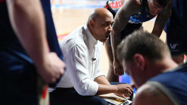 Adelaide 36ers coach CJ Bruton speaks to his group during their clash with the South East Melbourne Phoenix.