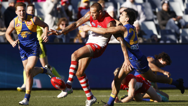 Lance Franklin takes a swing for goal against West Coast in Geelong.