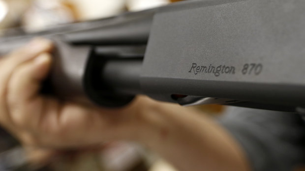 The Remington name is seen etched on a model 870 shotgun at Duke's Sport Shop in New Castle, Pennsylvania.