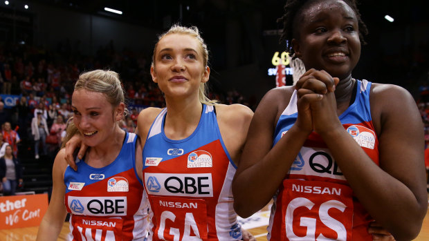 One to go: Natalie Haythornthwaite, Helen Housby and Sam Wallace walk off the court after their preliminary final win.
