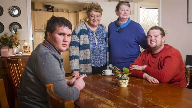 Mothers, Karna O'Dea (back left) and Sandra Blaik with their boys Malcolm O'Dea (left) and Rohan Delahoy want to set up a special community house where the boys can live and receive care after their parents are gone.