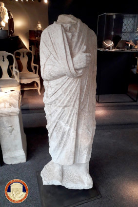 The headless Roman statue wearing a draped toga recovered in Brussels.