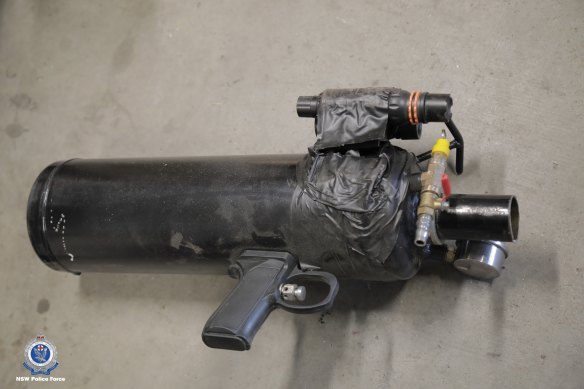 One of the weapons the police allegedly found was a homemade firearm made from gun parts and a gas canister.