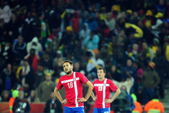 A dejected Milos Ninkovic reacts to Australia’s opening goal in 2010.