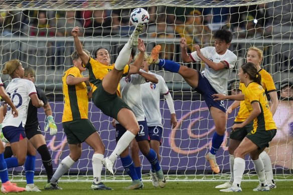 Emily Gielnik attempts a bicycle kick late in the first half.