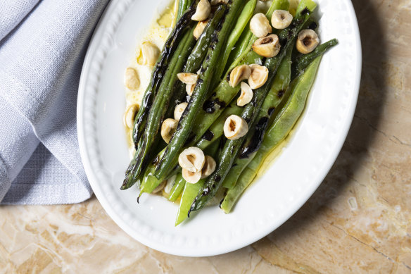 Barbecued beans with stracciatella and hazelnut.