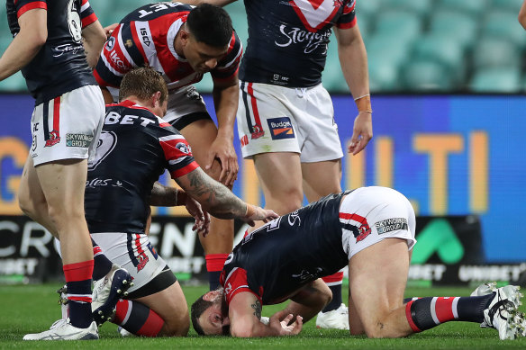 Boyd Cordner goes down after yet another a head knock.