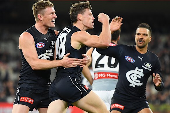 Sam Walsh celebrates a goal against the Power. 