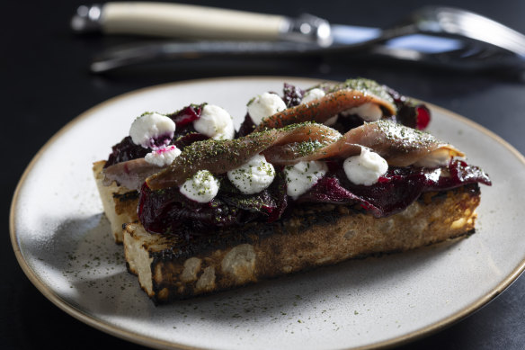 Anchovy toast with goat’s curd and pickled beetroot.
