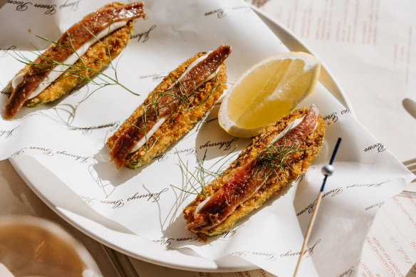 Crumbed and fried zucchini are like canoes for whipped cod roe and anchovy.