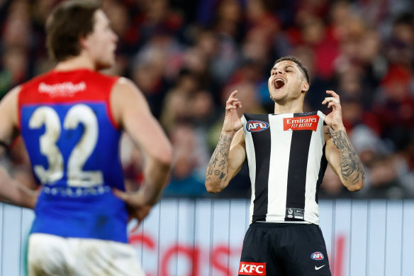Collingwood’s Bobby Hill celebrates a goal in front of tens of thousands raucous Magpies fans at last night’s qualifying final at the MCG.