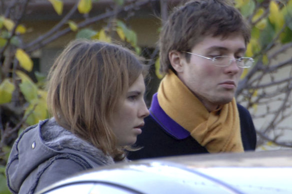American exchange student Amanda Knox and her Italian boyfriend Raffaele Sollecito on November 2, 2007, outside the rented house where Kercher was found dead.