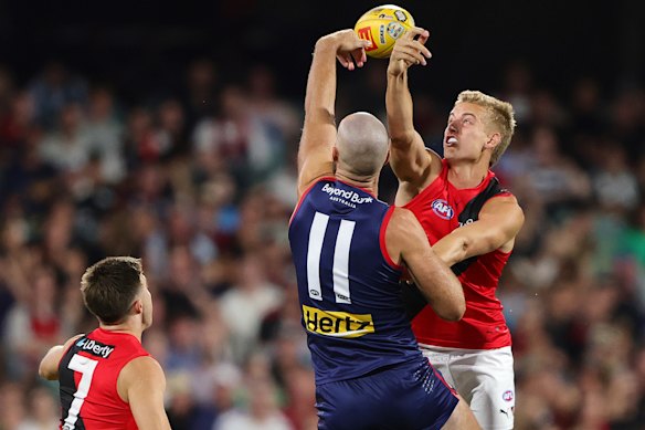 Max Gawn does battle with Nick Bryan.