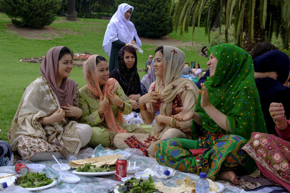 Lunch of many colours: Hazara women on Australia Day at Footscray Park.