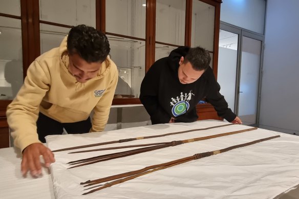 Members of the Gweagal Clan of the Dharawal Nation inspecting the Kamay spears in 2022.