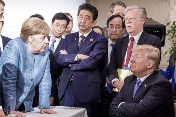 Condemnation: World leaders gather at the second day of the G7 meeting in Canada last year.