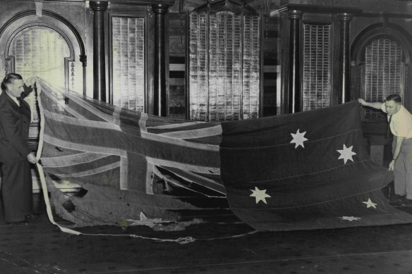 Australia's first flag is returned to Melbourne some years after it first fluttered.