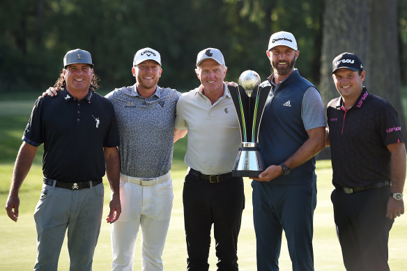 Pat Perez, Talor Gooch, Greg Norman, Dustin Johnson and Patrick Reed at the LIV Golf Invitational in Portland in July.
