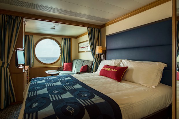 Staterooms on the Disney Magic and Disney Wonder are designed with nautical décor and plenty of usable space. Designed with style, comfort and a dash of Disney magic, staterooms include generous storage areas and premium bedding and linens. The innovative bath-and-a-half design is featured in nearly every stateroom on the Disney Magic and Disney Wonder. (Matt Stroshane, photographer)