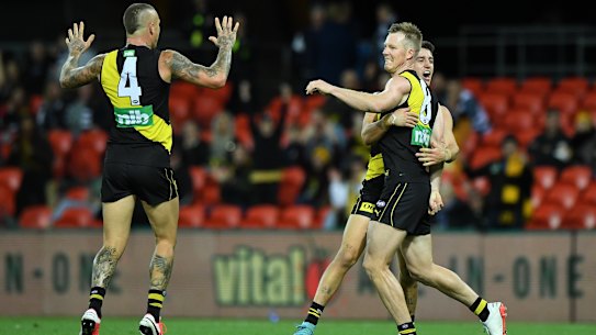 Jack Riewoldt celebrates a goal for the Tigers in their win over Geelong on Friday night.