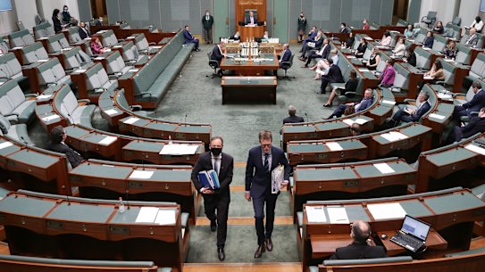 Minister for Health Greg Hunt and Attorney-General and Minister for Industrial Relations Christian Porter depart after Question Time at Parliament House in Canberra on Tuesday 10 November 2020. fedpol Photo: Alex Ellinghausen