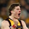 Josh Ward celebrates a goal against the Blues.