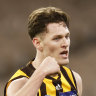 Hawk seeks trade to Tigers; Mid-season trading in AFL pay deal; Roos great set to leave