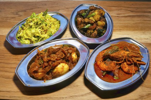 Clockwise from bottom left: Dishes of egg, cabbage, dry pork and prawns with okra at Toddy Shop.