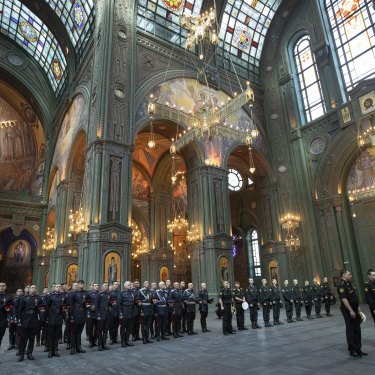 Russian servicemen attend a service at the cathedral. 