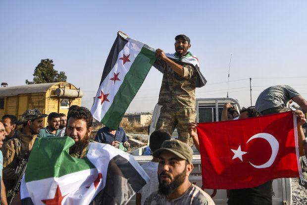Turkish-backed Syrian National Army fighters in Akcakale on October 13.