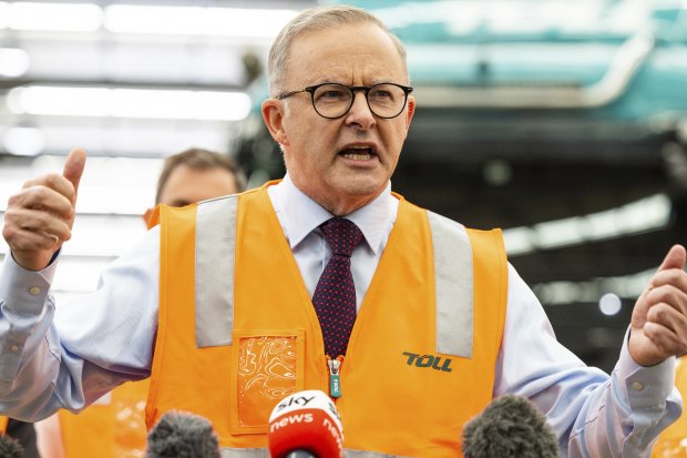 Albanese speaks to the press during a visit to the Toll NQX national office in Berrinba. 